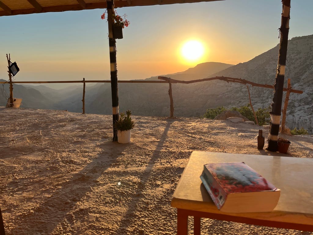 Sunset view from the terrace in Wild Dana Eco Lodge, the best hotel we slept in on this 14 day Jordan itinerary
