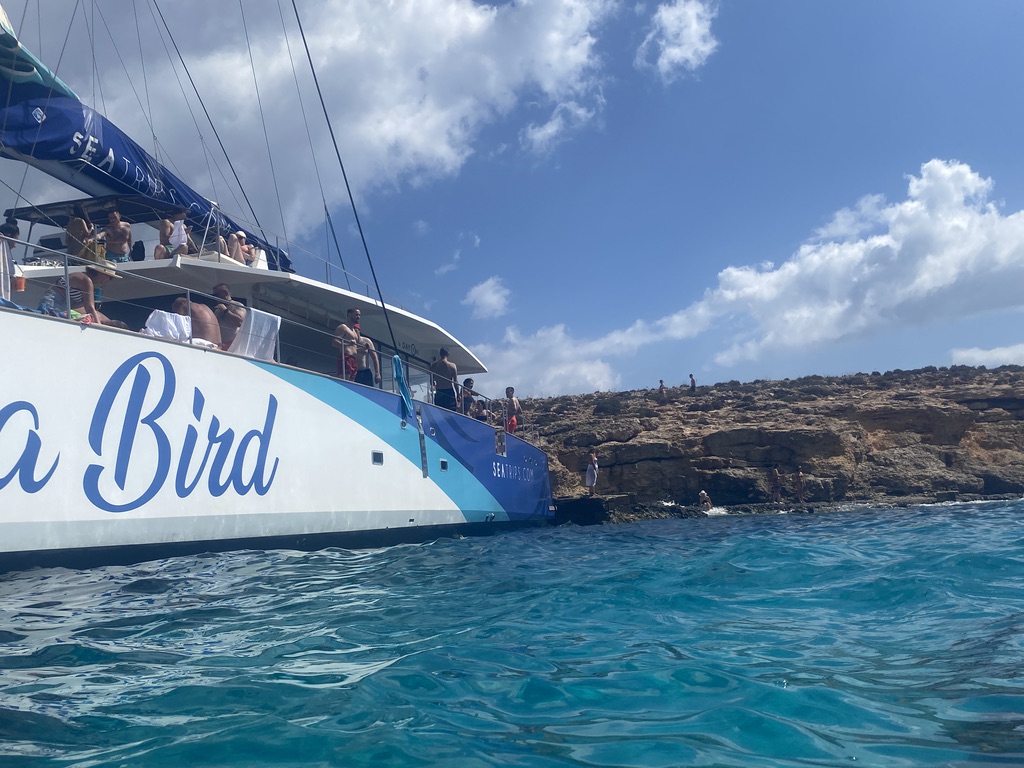 Not to miss while enjoying your Malta itinerary: a tour to Comina and the Blue Lagoon. Here you see the Sea Bird catamaran we went with